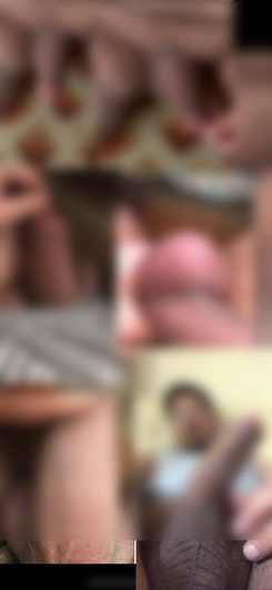 Blurred image of person holding phone, possibly taking selfie in indoor setting.