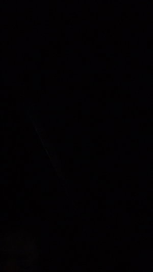 Completely dark image with no visible subject.