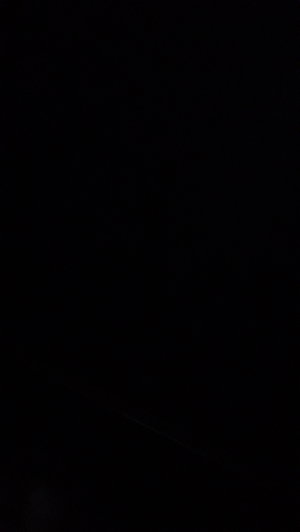 Completely dark image with a thin horizontal line.