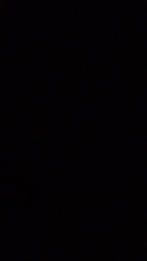 Blank black image with no visible content or person.