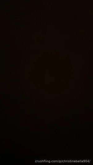 Dark image with no visible person or details.