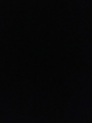 Solid black image with no visible content or person.