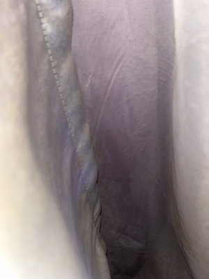 Close-up of sheer purple fabric.