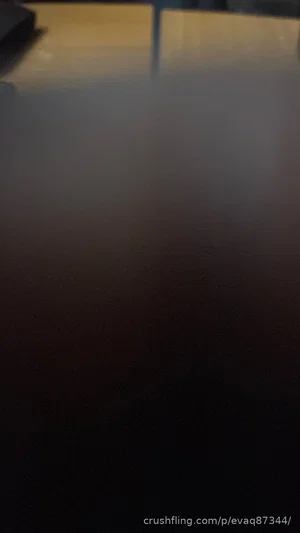 Dark, blurry image with no clear person or object visible.