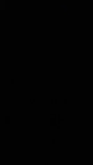 Blank black image with no visible content or person.