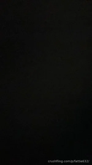 Dark image with no visible person or details.