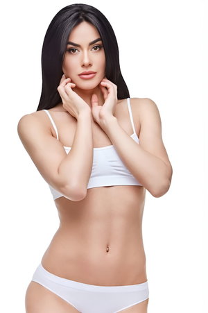 Slim woman with long dark hair in white bra and panties.