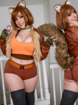 Curvy woman in orange top and shorts cosplaying squirrel indoors.