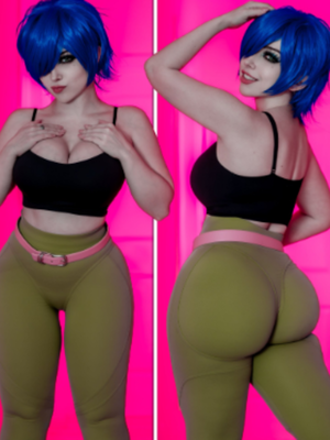Blue-haired woman in black top and green leggings posing in studio.