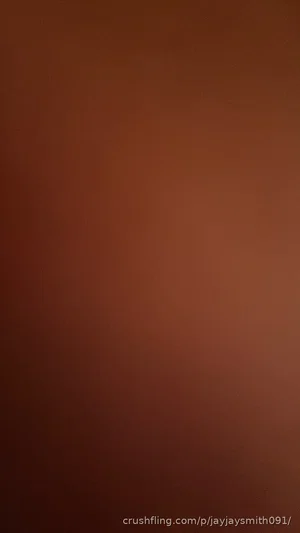 Solid brown background with no visible person or objects.