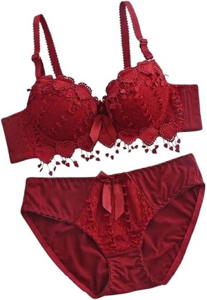 Red lace lingerie set with heart details and satin panties on white background.
