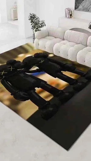 Black KAWS figures on rug in modern white living room with tufted sofa.
