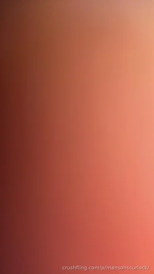 Solid gradient background in warm peach to red tones.