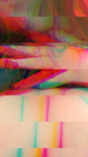 Colorful abstract image with skin tones and rainbow streaks, possibly a distorted close-up of a