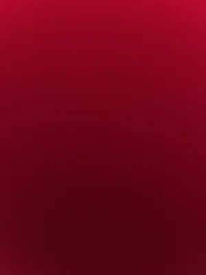 Solid red gradient background with no visible person or objects.