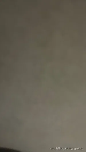 Blurred image with no clear person or object visible.