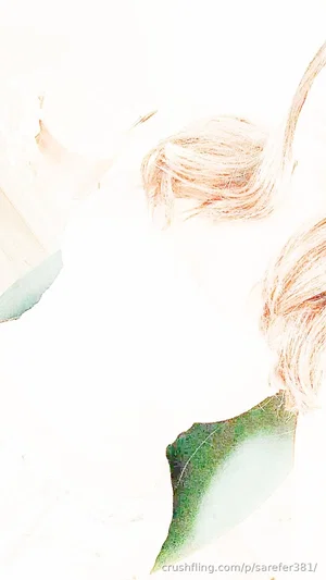 Blonde hair strands and green leaf fragments on white background.