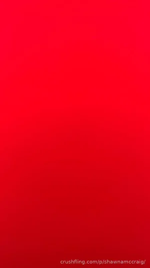 Solid red gradient background with no visible person or objects.