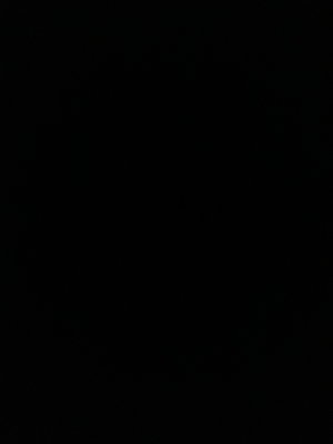 Solid black image with no visible content or person.