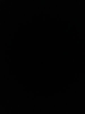 Blank black image with no visible content or person.