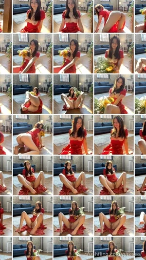 Woman in red dress posing with flowers in a living room, showing legs and backside.