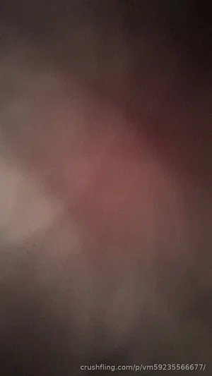 Blurred image with indistinct skin tones and no clear features or setting.
